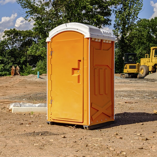 how often are the portable restrooms cleaned and serviced during a rental period in Heil